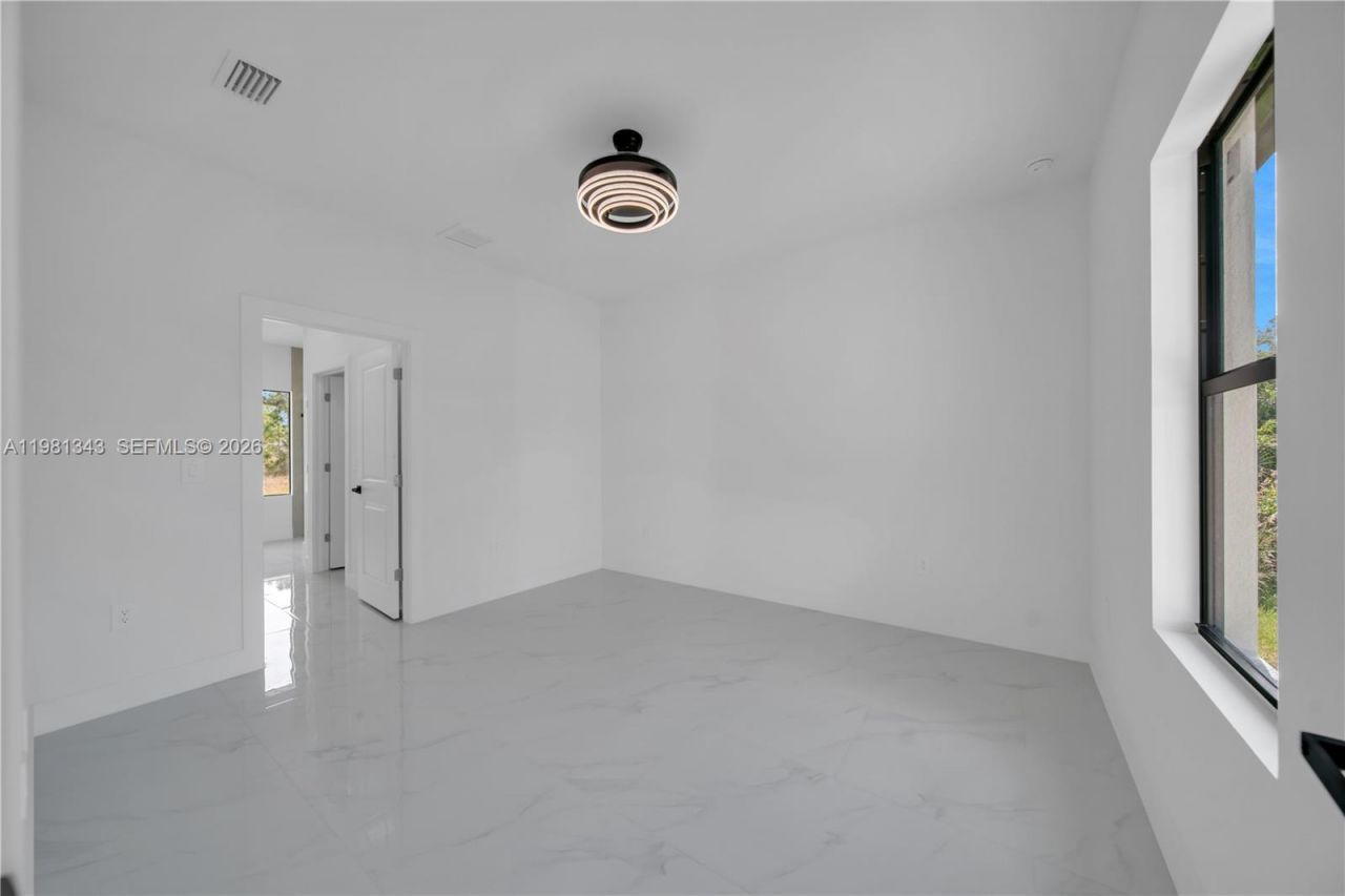 704 Holmes Ave, Lehigh Acres, FL 33974 Photo