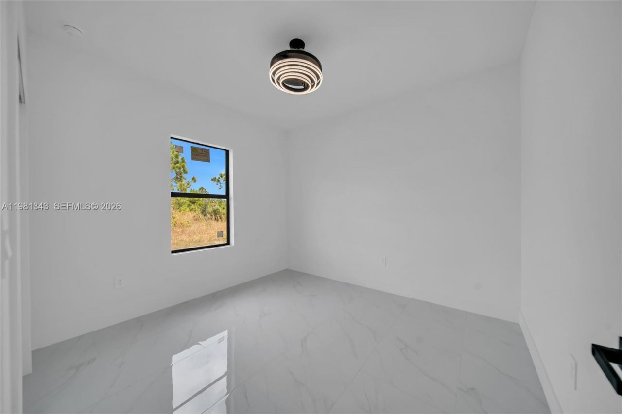 704 Holmes Ave, Lehigh Acres, FL 33974 Photo