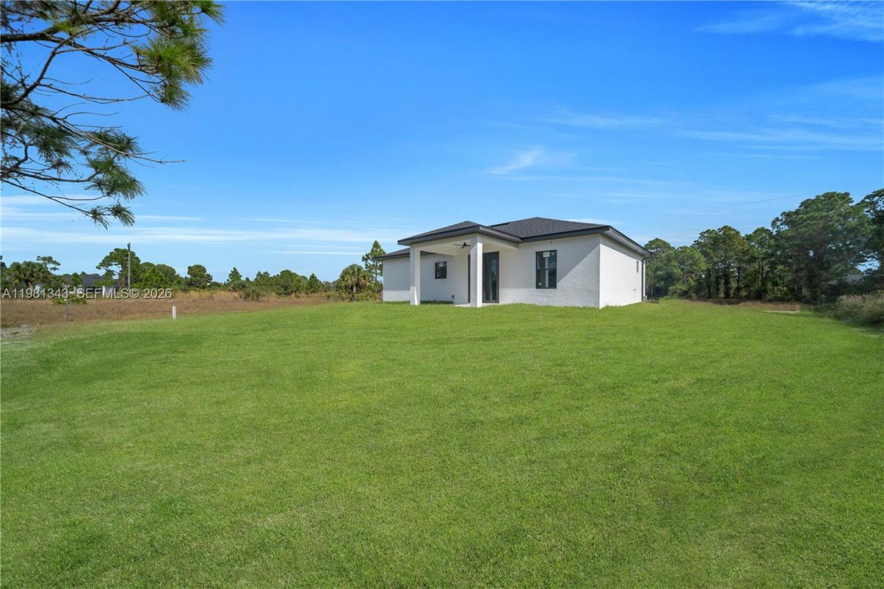 704 Holmes Ave, Lehigh Acres, FL 33974 Photo
