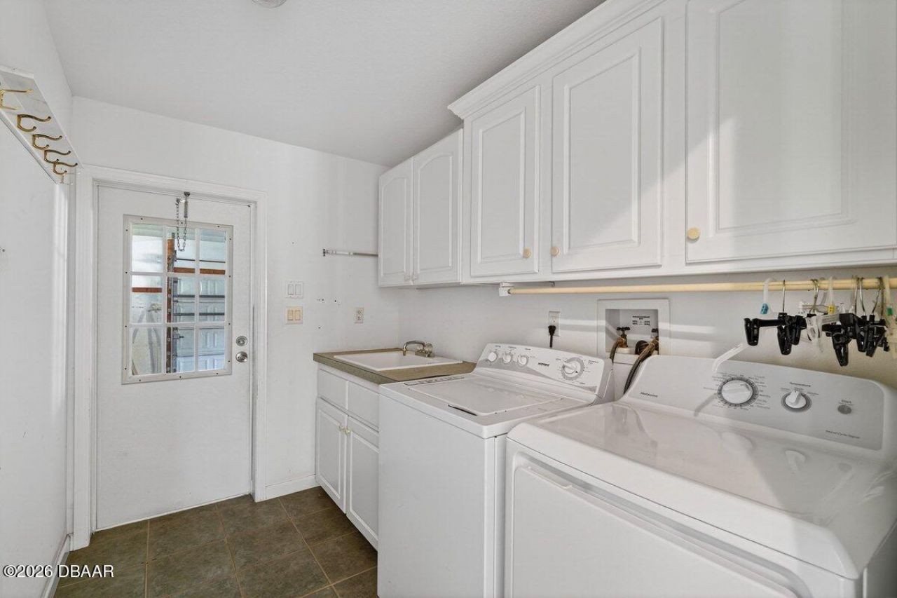 332 Marsh Landing Loop, Oak Hill, FL 32759 Photo