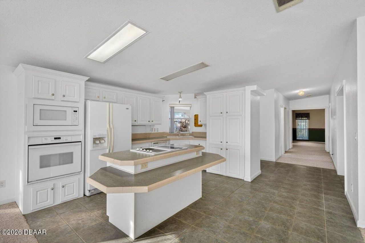 332 Marsh Landing Loop, Oak Hill, FL 32759 Photo