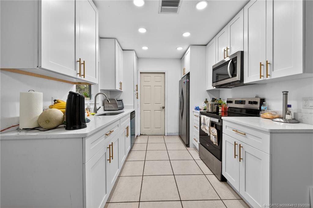 598 SW Lakehurst Drive, Port Saint Lucie, FL 34983 Photo