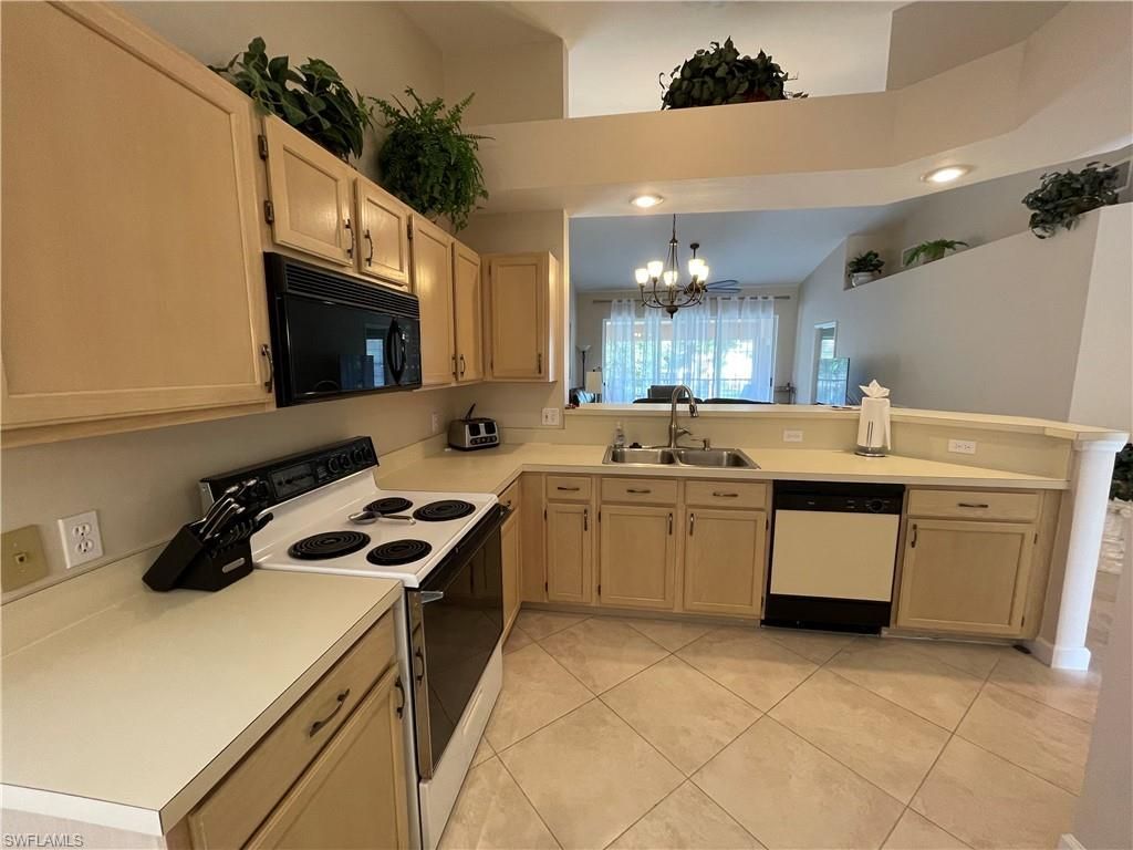 440 Wiggins Lake Ct, Unit 201, Naples, FL 34110 Photo