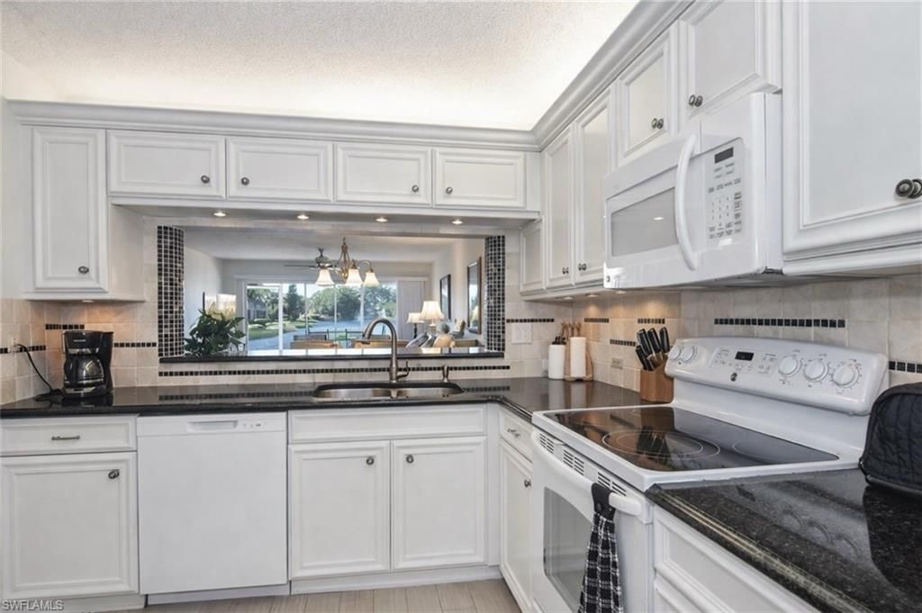 1250 Yesica Ann Cir, Unit E102, Naples, FL 34110 Photo