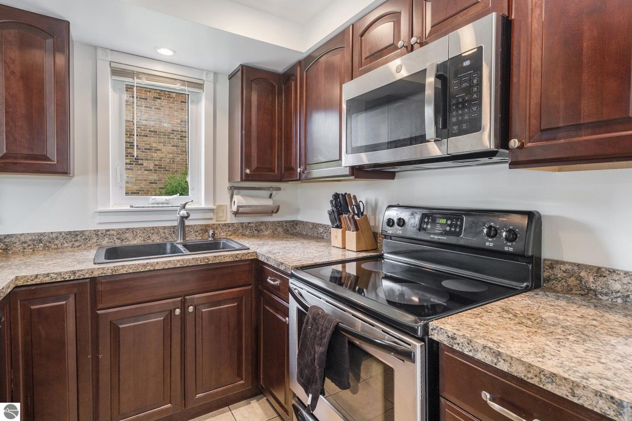 6022 Holt Road, Unit 2, Williamsburg, MI 49690 Main Photo