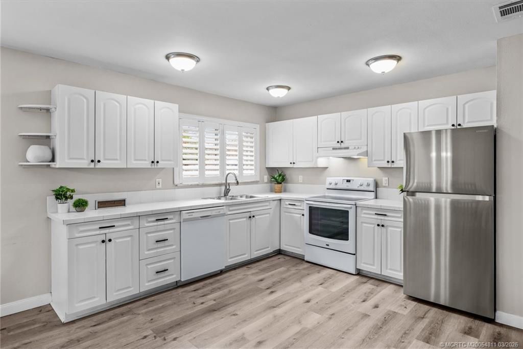 1673 SE Lyngate Drive, Port Saint Lucie, FL 34952 Photo