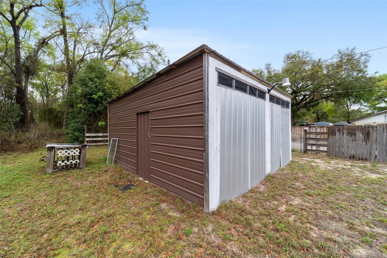 10496 SE Sunset Harbor Road, Summerfield, FL 34491 Photo