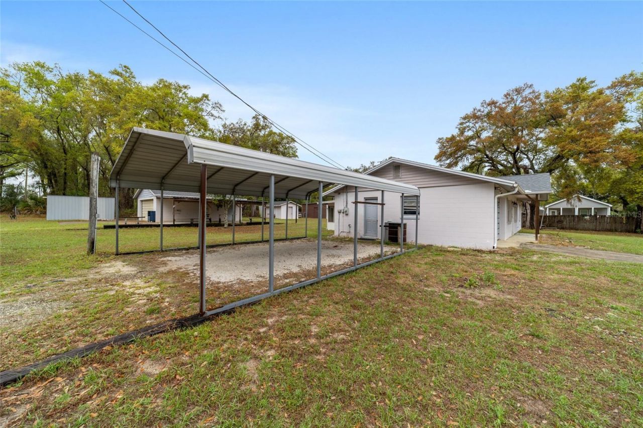 10496 SE Sunset Harbor Road, Summerfield, FL 34491 Photo