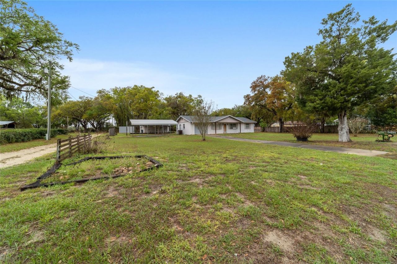 10496 SE Sunset Harbor Road, Summerfield, FL 34491 Photo