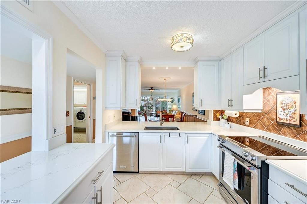 3032 Sandpiper Bay Cir, Unit G205, Naples, FL 34112 Photo