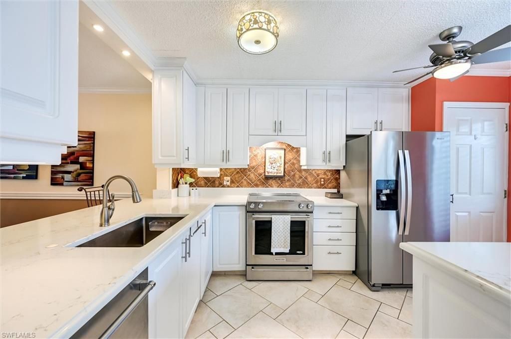 3032 Sandpiper Bay Cir, Unit G205, Naples, FL 34112 Photo
