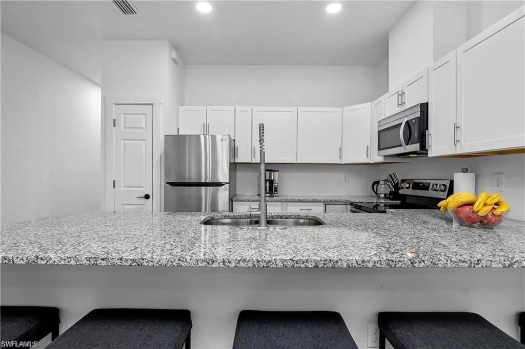 313/315 Ivan Ave S, Lehigh Acres, FL 33973 Photo