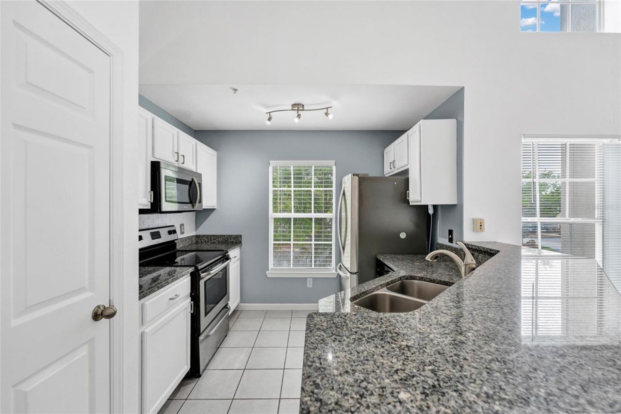 9013 Lee Vista Boulevard, Unit 1910, Orlando, FL 32829 Photo