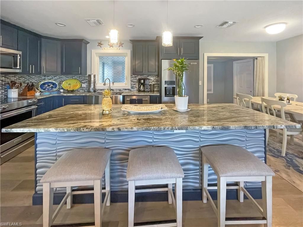 3711 Tangelo Dr , Saint James City, FL 33956 Photo