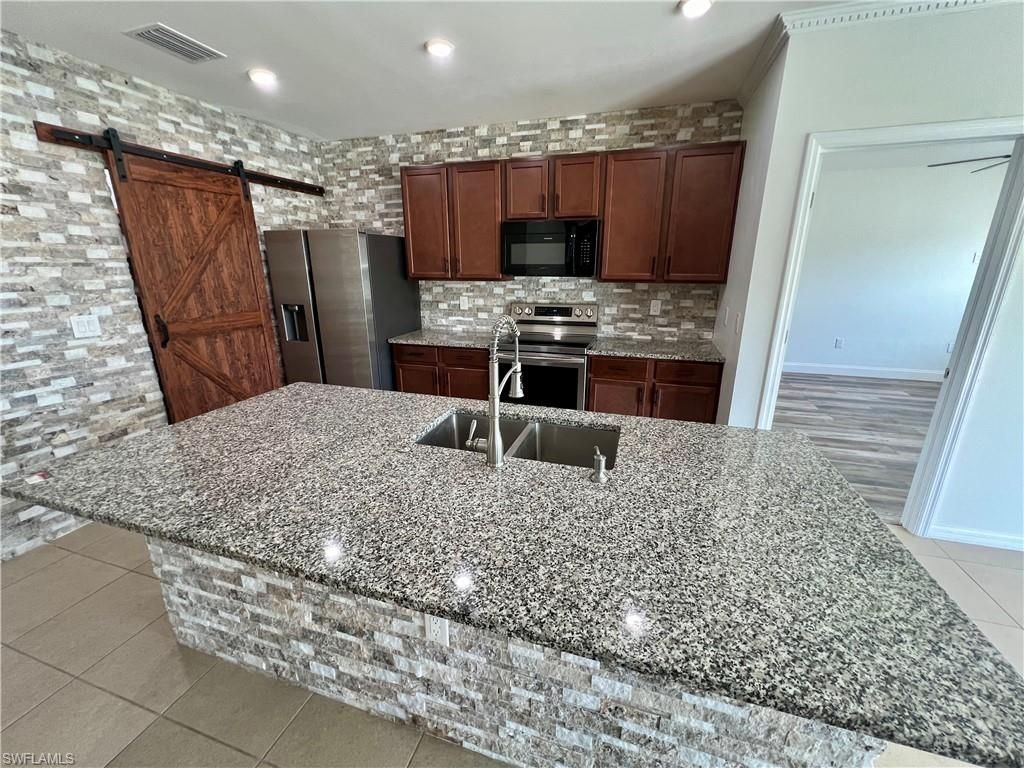 10293 Silver Pond Ln , Lehigh Acres, FL 33936 Photo