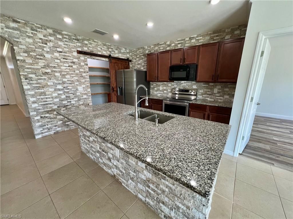 10293 Silver Pond Ln , Lehigh Acres, FL 33936 Photo