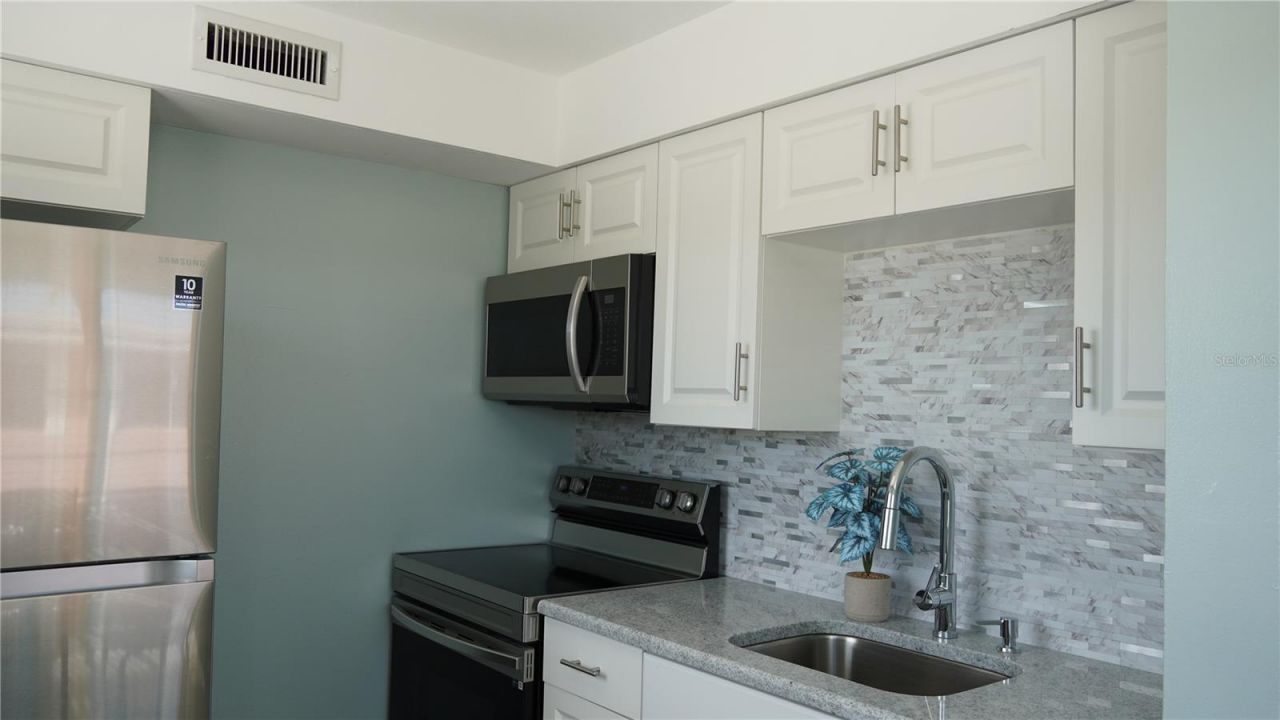 416 Monroe Avenue, Unit F201, Cape Canaveral, FL 32920 Photo