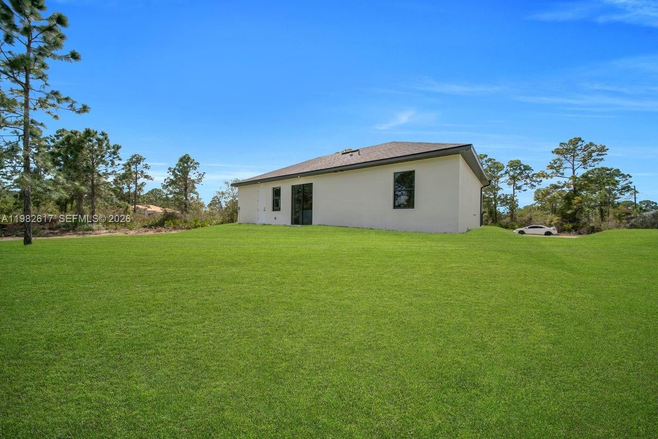 637 Summit Ave S, Lehigh Acres, FL 33974 Photo