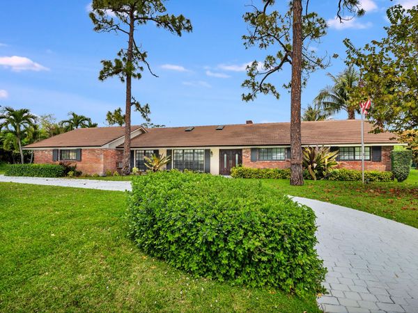 320 N Country Club Drive, Atlantis, FL 33462