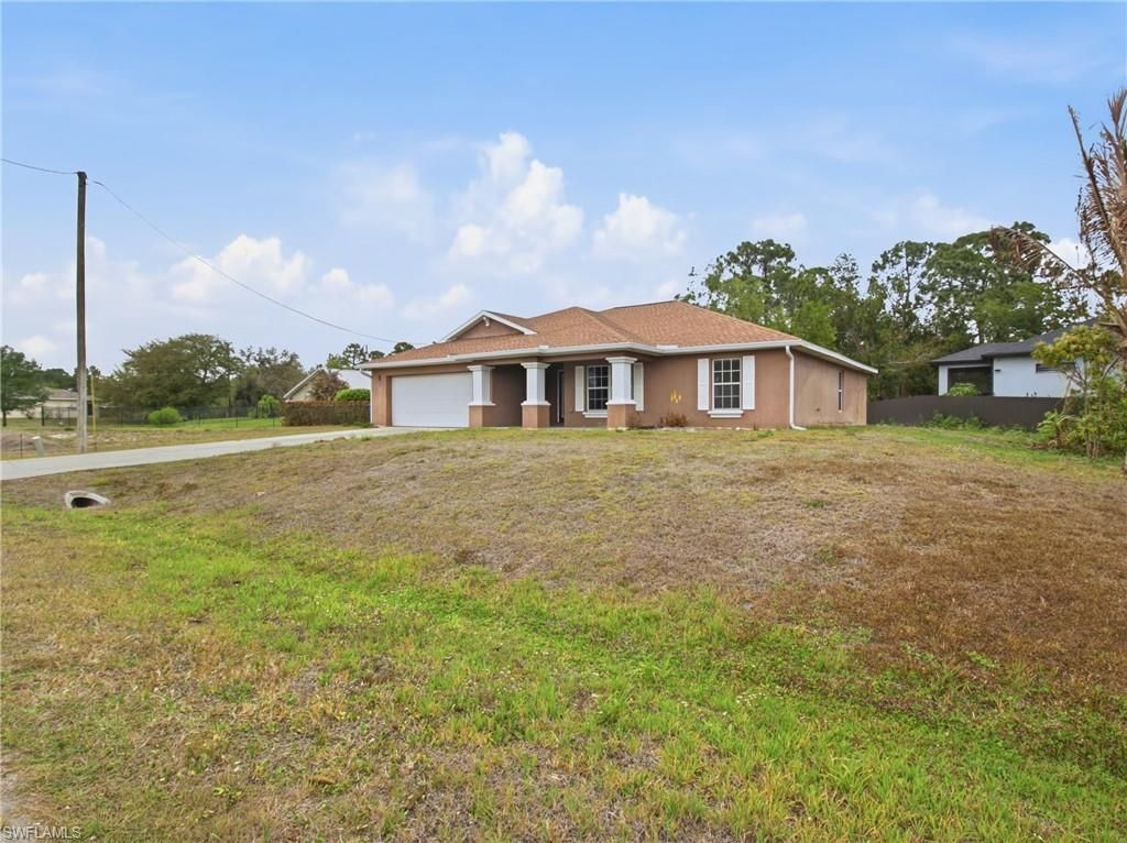 731 Long Lines Ln, Lehigh Acres, FL 33974 Photo