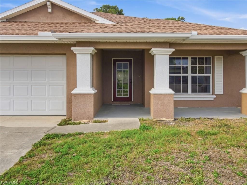 731 Long Lines Ln, Lehigh Acres, FL 33974 Photo