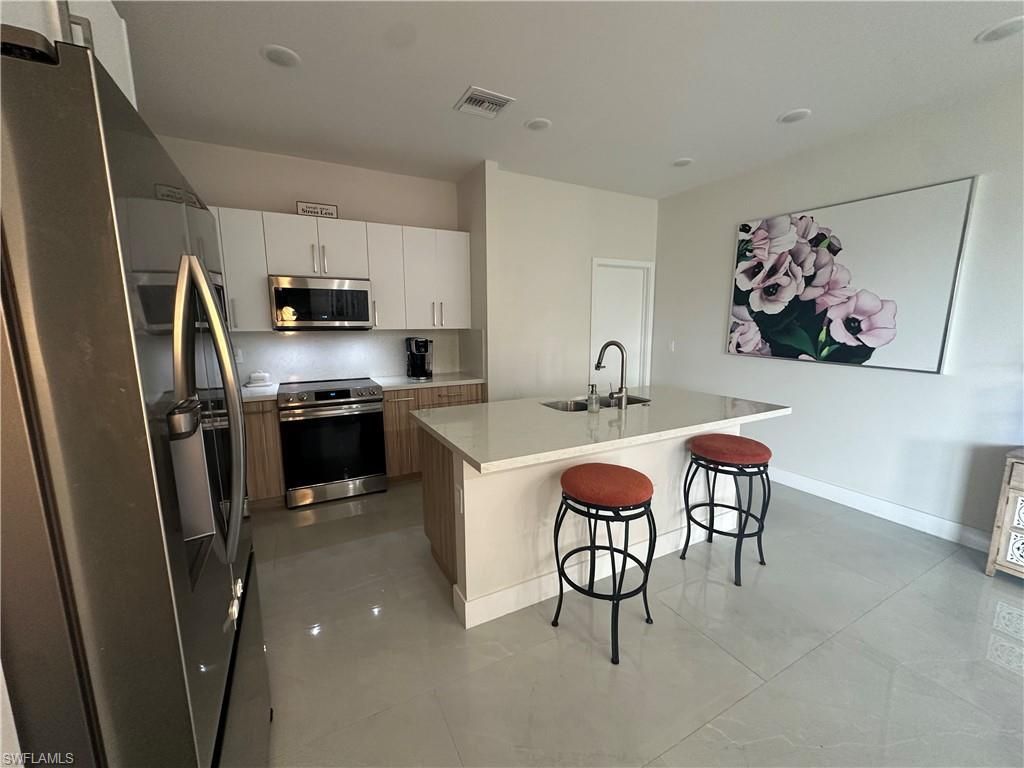 1613 N Gator Cir , Cape Coral, FL 33909 Photo