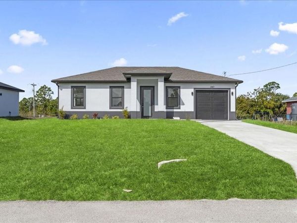 1143 BARFIELD STREET E, LEHIGH ACRES, FL 33974