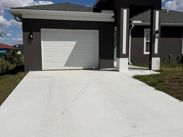 721 IVAN AVENUE S, LEHIGH ACRES, FL 33973