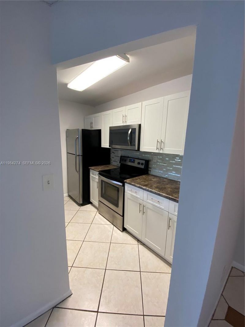 7035 NW 186th St , Unit D305, Hialeah, FL 33015 Photo