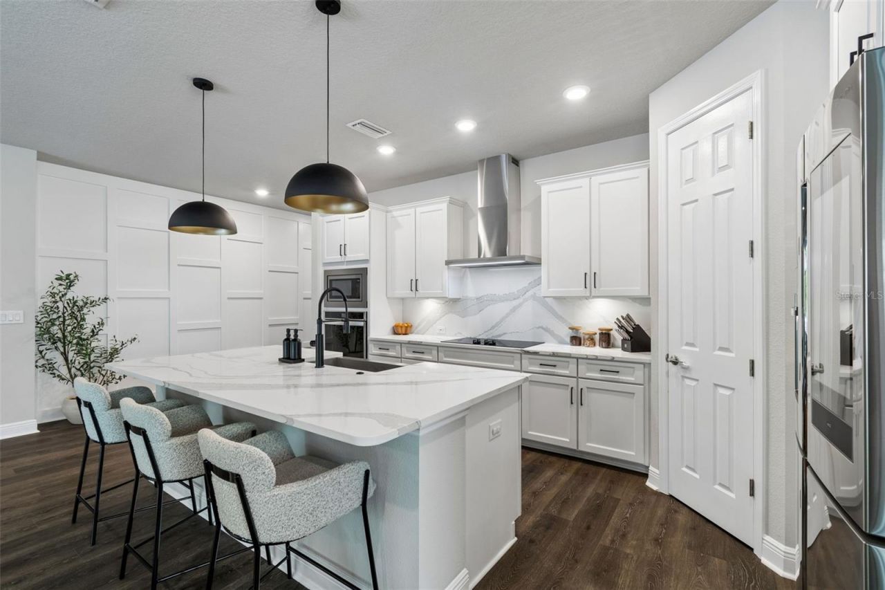 4911 Lakeshore Oaks Court, Tampa, FL 33624 Photo