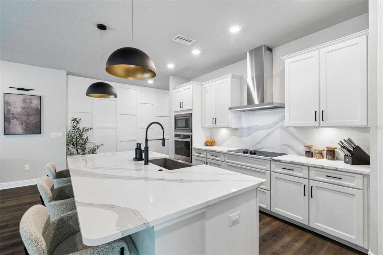 4911 Lakeshore Oaks Court, Tampa, FL 33624 Photo