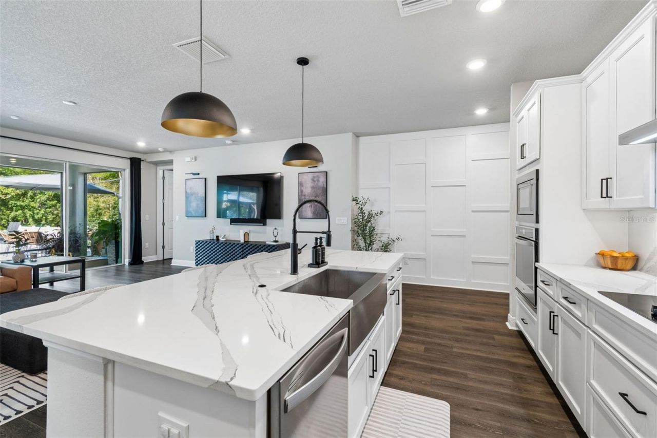 4911 Lakeshore Oaks Court, Tampa, FL 33624 Photo