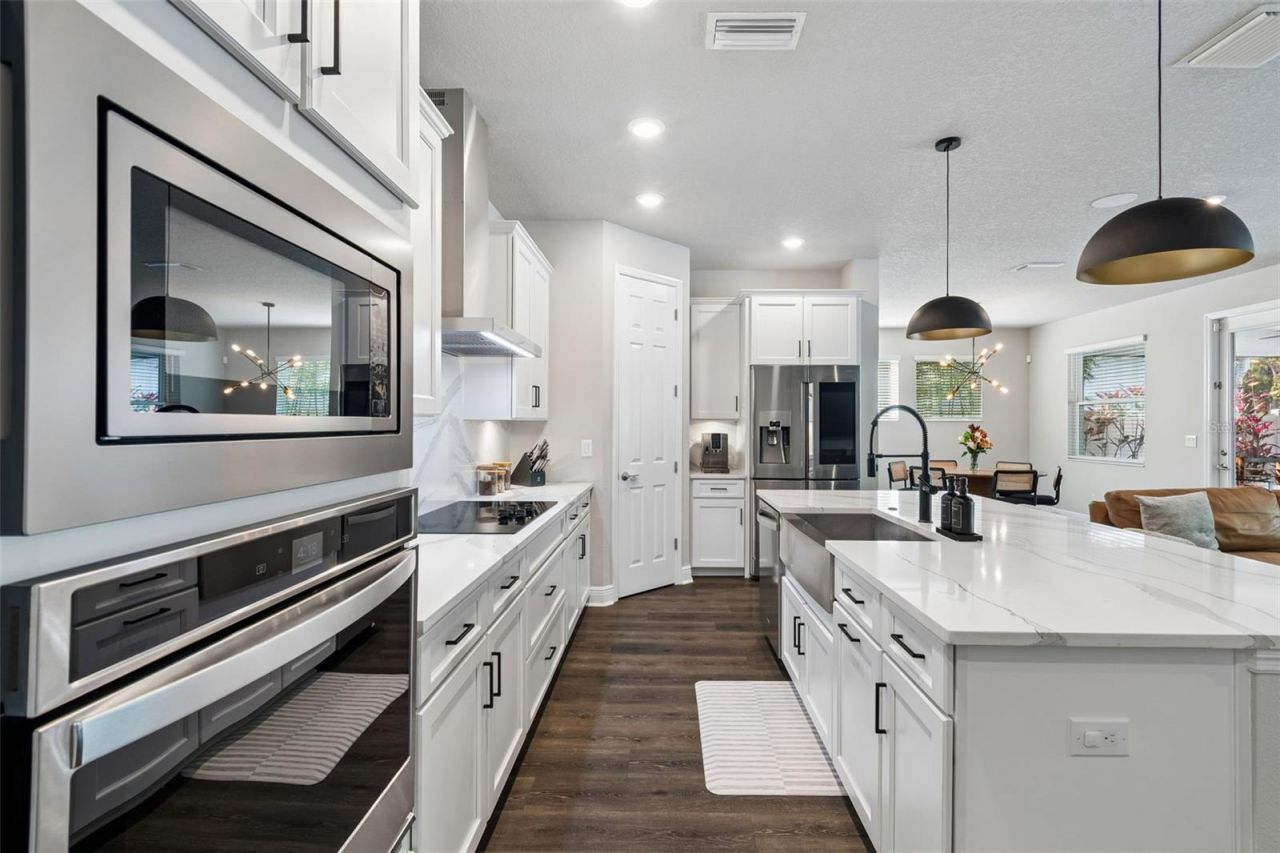 4911 Lakeshore Oaks Court, Tampa, FL 33624 Photo