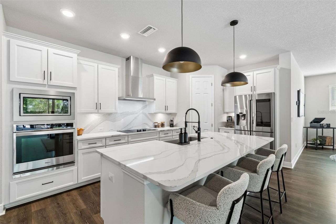 4911 Lakeshore Oaks Court, Tampa, FL 33624 Photo