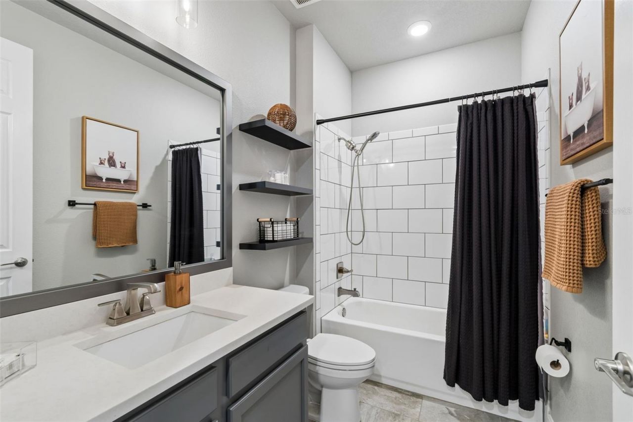 4911 Lakeshore Oaks Court, Tampa, FL 33624 Photo