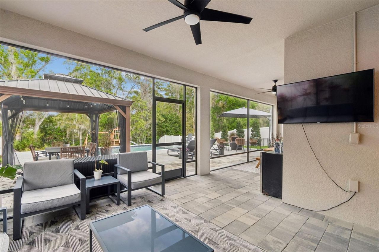 4911 Lakeshore Oaks Court, Tampa, FL 33624 Photo