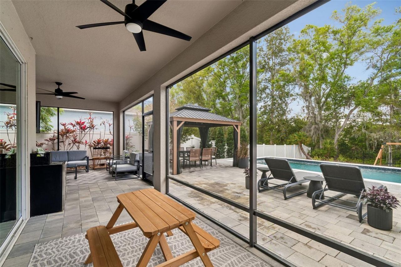 4911 Lakeshore Oaks Court, Tampa, FL 33624 Photo