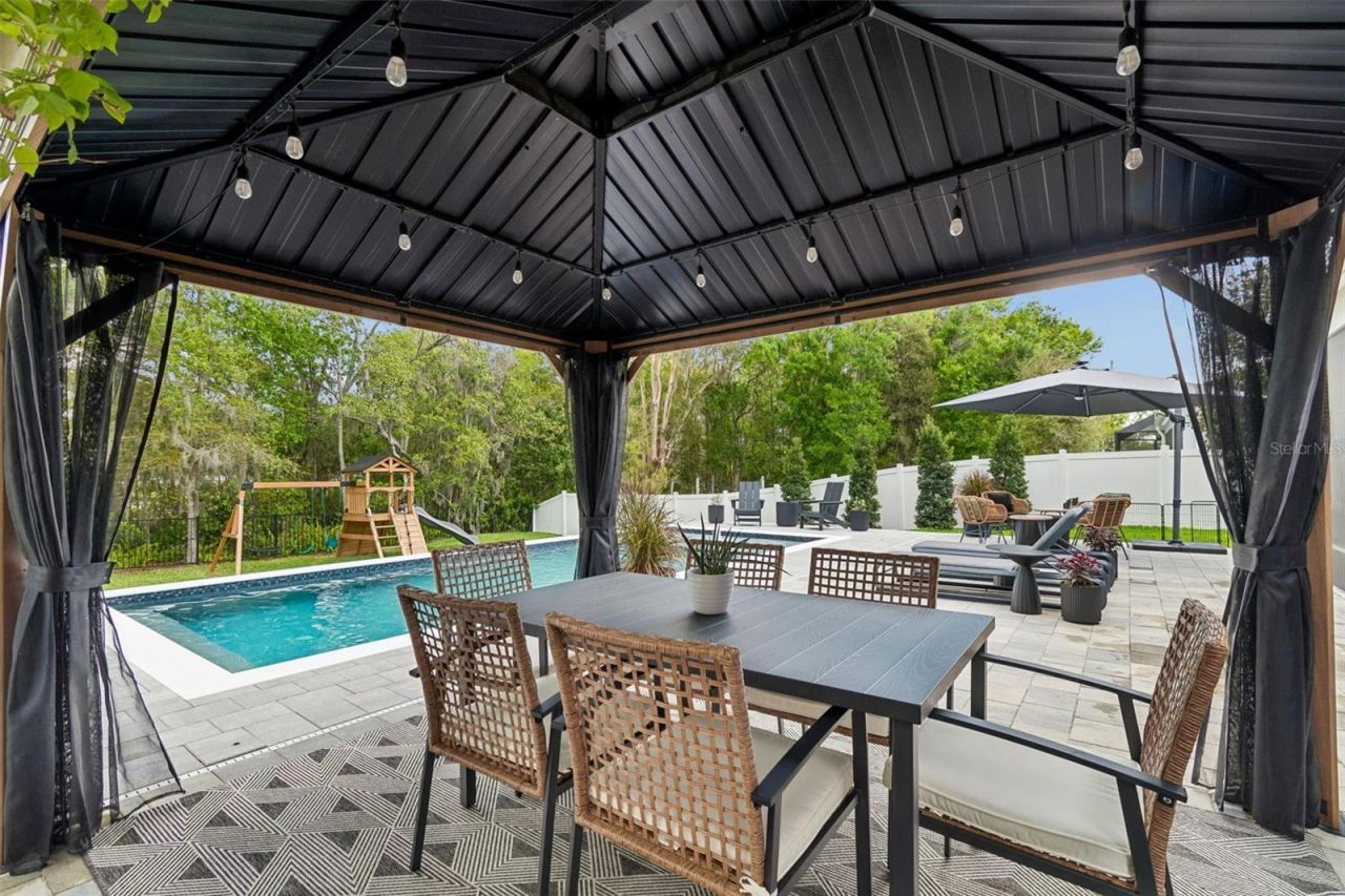 4911 Lakeshore Oaks Court, Tampa, FL 33624 Photo