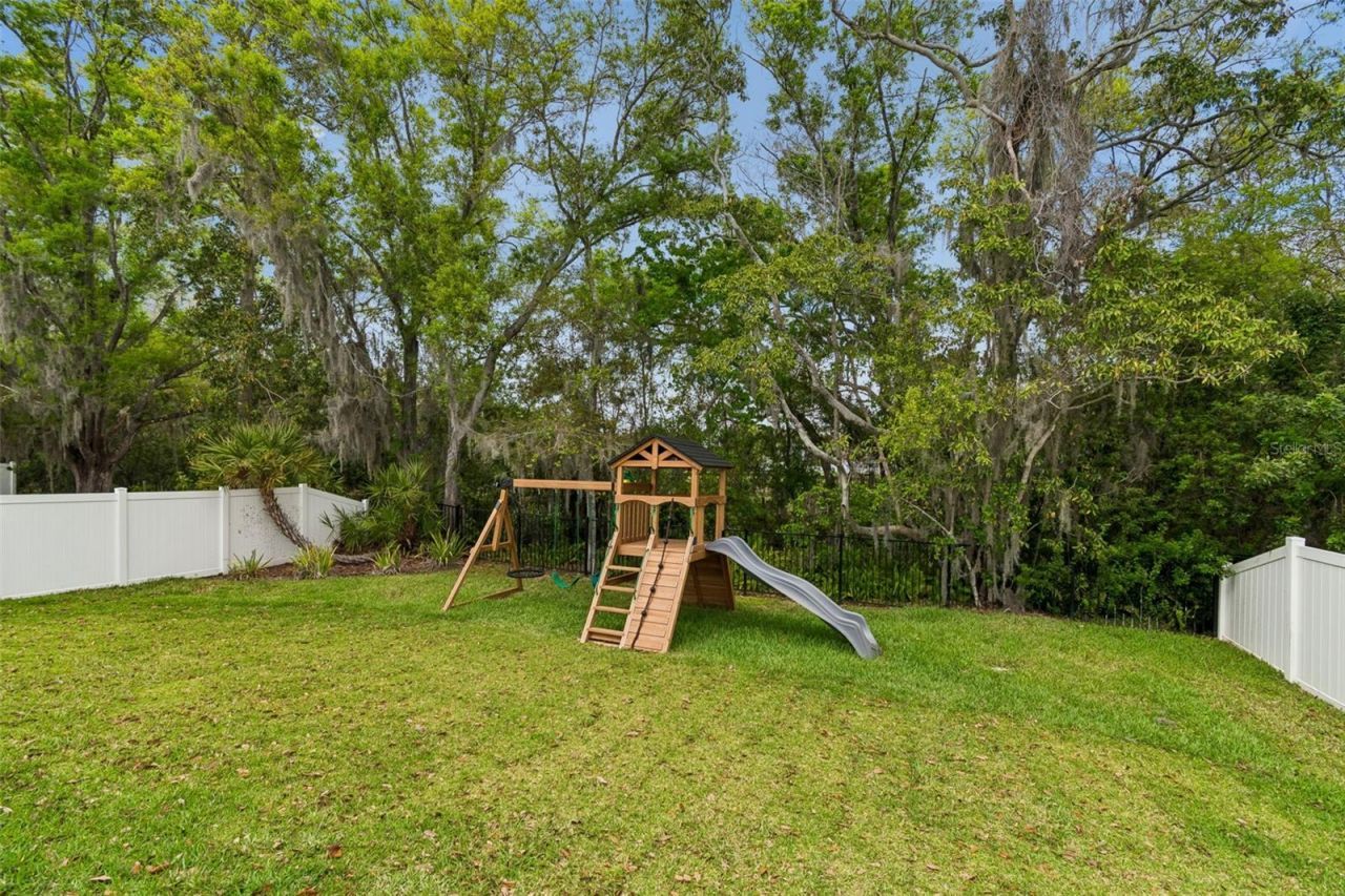 4911 Lakeshore Oaks Court, Tampa, FL 33624 Photo