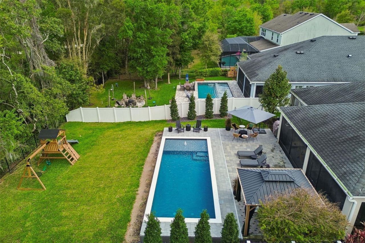 4911 Lakeshore Oaks Court, Tampa, FL 33624 Photo