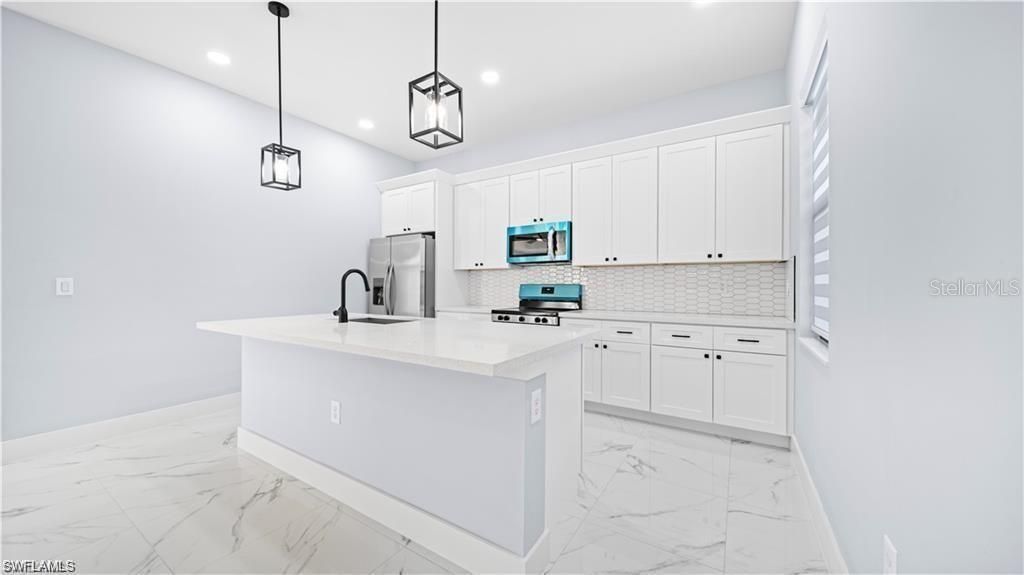 1210 Clayton Avenue , Lehigh Acres, FL 33972 Photo