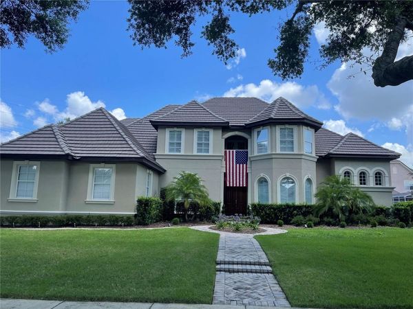 8734 CRESTGATE CIRCLE, ORLANDO, FL 32819