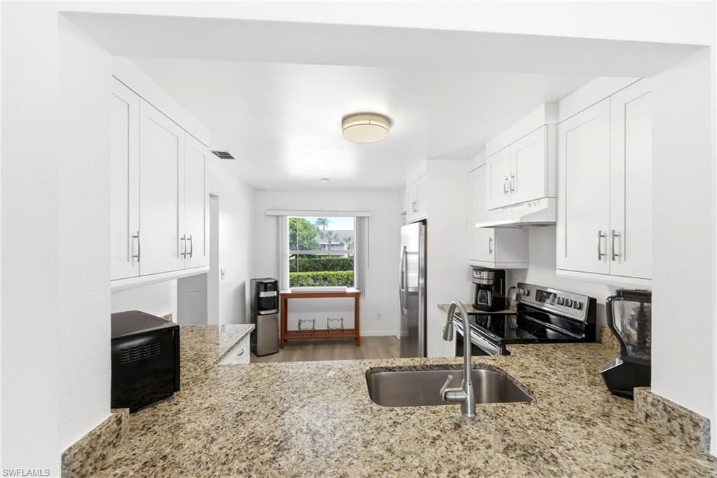 1476 Churchill Cir , Unit J203, Naples, FL 34116 Photo