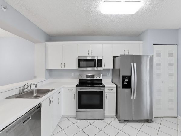 9511 Weldon Circle, Unit G207, Tamarac, FL 33321