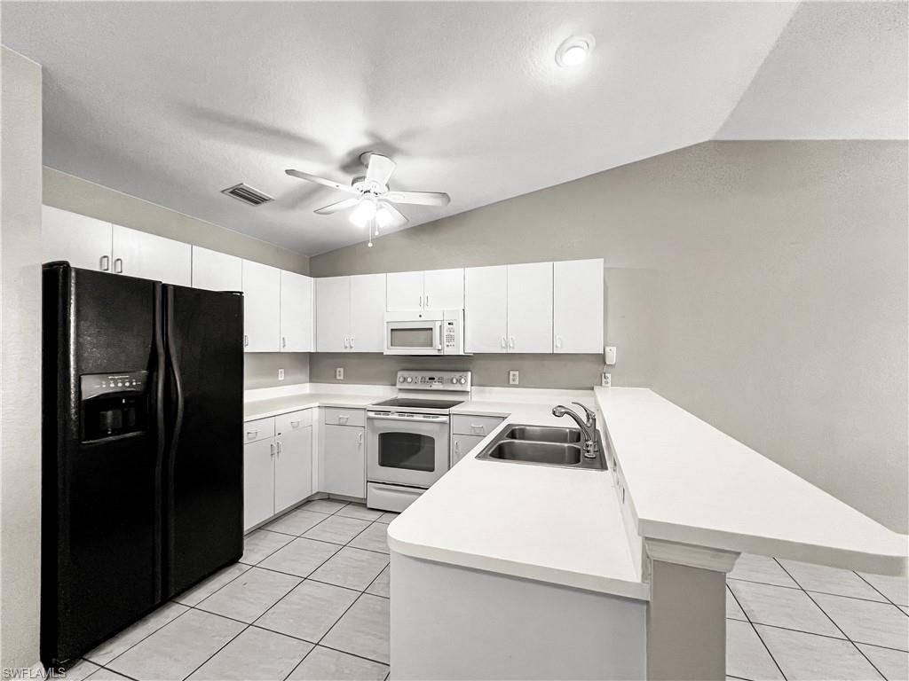 1215 SE 8th Ave , Cape Coral, FL 33990 Photo