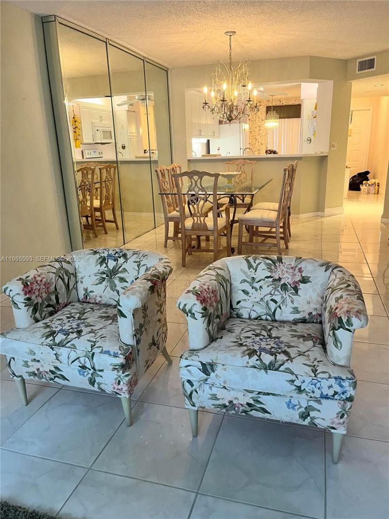 9599 Weldon Cir , Unit A203, Tamarac, FL 33321 Photo