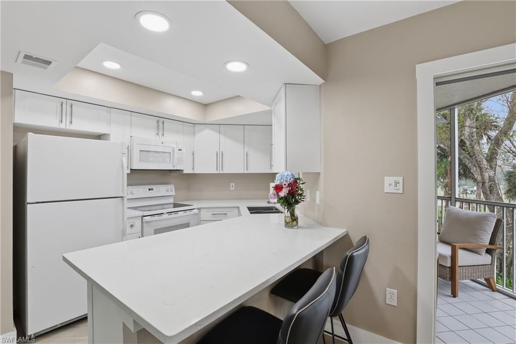 481 Quail Forest Blvd , Unit B210, Naples, FL 34105 Photo