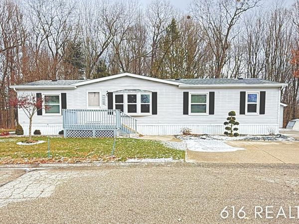 7358 Willow Wood Drive NE, Belmont, MI 49306
