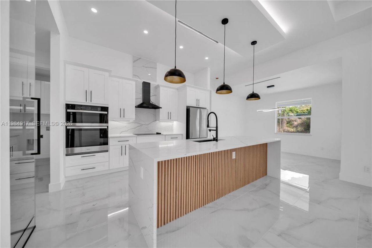 704 Clayton, Lehigh Acres, FL 33972 Photo