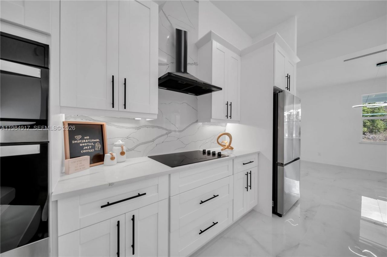 704 Clayton, Lehigh Acres, FL 33972 Photo